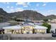 Stylish home with floor-to-ceiling windows offering stunning mountain views at 27 W Cochise Dr, Phoenix, AZ 85021