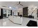 Spacious living room with a modern fireplace and large windows at 27 W Cochise Dr, Phoenix, AZ 85021
