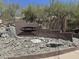 Community sign for Mount Central Place is surrounded by desert landscaping at 27 W Cochise Dr, Phoenix, AZ 85021