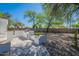 Backyard featuring a built-in bar, gravel landscape and artificial turf for low-maintenance enjoyment at 2991 E Folley Pl, Chandler, AZ 85225
