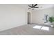 Bright bedroom with soft carpet, an airy feel, and a glass door that leads outside at 2991 E Folley Pl, Chandler, AZ 85225