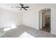 Spacious bedroom with soft carpet, an airy feel, and a doorway that leads to another space at 2991 E Folley Pl, Chandler, AZ 85225