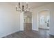 View of dining room looking into the Gathering room and kitchen at 2991 E Folley Pl, Chandler, AZ 85225