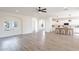 Spacious living area with archways, neutral colors, and views into the kitchen and other living spaces at 2991 E Folley Pl, Chandler, AZ 85225