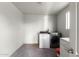 Laundry room featuring a washer, dryer, and ample room at 3021 E Larkspur Dr, Phoenix, AZ 85032