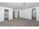 Spacious primary bedroom with neutral carpet and multiple walk-in closets providing ample storage at 3022 E Emile Zola Ave, Phoenix, AZ 85032