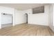 Bright living room featuring light wood flooring, an open floor plan and plenty of natural light at 3022 E Emile Zola Ave, Phoenix, AZ 85032