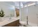 Modern bathroom with a glass shower, white marble accents, and a sleek vanity at 3141 S 155Th Ln, Goodyear, AZ 85338
