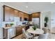 Well-designed kitchen with stainless appliances and a dining area for casual meals at 3141 S 155Th Ln, Goodyear, AZ 85338