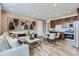 Inviting living area with modern furniture and a full kitchen, blending comfort and functionality at 3141 S 155Th Ln, Goodyear, AZ 85338