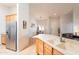 Bright open-concept kitchen boasts stainless steel appliances and an island with a sink at 3252 E Maldonado Dr, Phoenix, AZ 85042