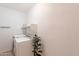 Functional laundry room with modern washer and dryer, maximizing convenience for chores at 3252 E Maldonado Dr, Phoenix, AZ 85042
