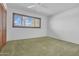 Bright bedroom with a large window and neutral walls, ready for personalization at 3637 E Monterosa St # 3, Phoenix, AZ 85018