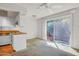 Cozy kitchen area featuring a sliding glass door leading to the outdoor space at 3637 E Monterosa St # 3, Phoenix, AZ 85018