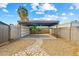 Open carport with gravel and paver ground covering at 5127 W Willow Ave, Glendale, AZ 85304