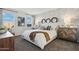 Serene primary bedroom with plenty of natural light, stylish décor, and a calming color scheme at 5751 E Axle Ln, San Tan Valley, AZ 85140
