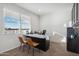 Home office with a granite-topped desk, natural light, and room for productivity at 5751 E Axle Ln, San Tan Valley, AZ 85140