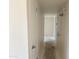 Hallway with closet doors and entry to other rooms at 6226 W Coronado Rd, Phoenix, AZ 85035