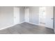 Bedroom with wood-look floors, closet and open ensuite bathroom at 6316 N 23Rd Ave, Phoenix, AZ 85015