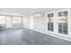 Spacious and bright living area with grey flooring, and access to the backyard at 6316 N 23Rd Ave, Phoenix, AZ 85015
