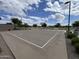 Outdoor basketball court offers recreational opportunities with blue skies and some clouds at 686 N 152Nd Dr, Goodyear, AZ 85338