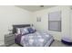 Cozy bedroom with natural light, comfortable bed, and stylish decor for a relaxing atmosphere at 7028 W Lincoln St, Peoria, AZ 85345