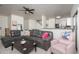 Spacious living room with modern decor and plush seating arrangements at 7028 W Lincoln St, Peoria, AZ 85345