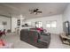This wide open living space features carpet and is adjacent to the modern kitchen at 7028 W Lincoln St, Peoria, AZ 85345