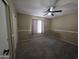 Cozy bedroom with neutral walls, carpeted floors, and ample natural light at 7240 W Los Gatos Dr, Glendale, AZ 85310