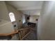 Spacious living room showcases high ceilings, natural light, and a pool table for entertainment at 7240 W Los Gatos Dr, Glendale, AZ 85310