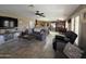 Open-concept living area flowing into a kitchen, designed for modern living at 7240 W Los Gatos Dr, Glendale, AZ 85310