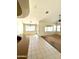 Open-concept living space featuring tile flooring, large windows, and ample natural light, perfect for comfortable living at 7310 W Pioneer St, Phoenix, AZ 85043