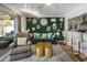 Stylish living room featuring trendy gold accents, and an eye-catching wall that adds character at 7608 E Avalon Dr, Scottsdale, AZ 85251