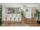 Bright living area featuring a breakfast bar with seating and light wood flooring throughout at 7608 E Avalon Dr, Scottsdale, AZ 85251