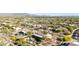 Overhead view of a community showcasing desert landscaping and the property's pool at 7848 E Parkview Ln, Scottsdale, AZ 85255