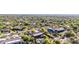 A beautiful home from above, with stunning desert landscape and a swimming pool at 7848 E Parkview Ln, Scottsdale, AZ 85255