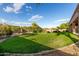 Expansive backyard with lush green lawn, ideal for outdoor activities and relaxation at 7848 E Parkview Ln, Scottsdale, AZ 85255
