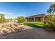 Large backyard featuring a well-maintained lawn and planting beds, perfect for gardening and outdoor enjoyment at 7848 E Parkview Ln, Scottsdale, AZ 85255