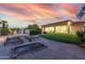 Expansive backyard with garden, patio, and lush lawn, perfect for outdoor entertaining and relaxation at 7848 E Parkview Ln, Scottsdale, AZ 85255