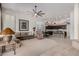 Expansive living area combining living, dining, and kitchen spaces, enhanced with modern lighting and seamless flooring at 7848 E Parkview Ln, Scottsdale, AZ 85255