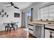 Cozy kitchen dining area with a sliding door and stainless steel dishwasher at 7977 W Wacker Rd # 134, Peoria, AZ 85381