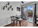 Charming dining area with patio access and a modern decor at 7977 W Wacker Rd # 134, Peoria, AZ 85381