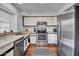 Well-lit kitchen with stainless steel appliances and classic cabinets at 7977 W Wacker Rd # 134, Peoria, AZ 85381