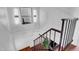 A bright staircase with modern lighting and metal railing leads to the next level at 7977 W Wacker Rd # 134, Peoria, AZ 85381