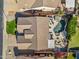 Aerial view of a home with a private pool, spa, and well-maintained landscaping at 8531 E Natal Cir, Mesa, AZ 85209