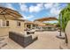 Inviting backyard showcases a pool, lounge seating, and meticulously landscaped areas at 8531 E Natal Cir, Mesa, AZ 85209