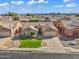 Charming single-story home with a well-manicured lawn and landscaping in a suburban neighborhood at 8531 E Natal Cir, Mesa, AZ 85209