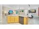 Kitchen island flowing into the living and dining areas, great for entertaining at 8531 E Natal Cir, Mesa, AZ 85209