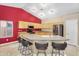 Bright kitchen with a breakfast bar, stainless steel appliances, and ample cabinet space at 8531 E Natal Cir, Mesa, AZ 85209