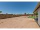 Backyard space with a block fence surrounding the perimeter offering privacy and security at 900 S Palo Verde Dr, Apache Junction, AZ 85120